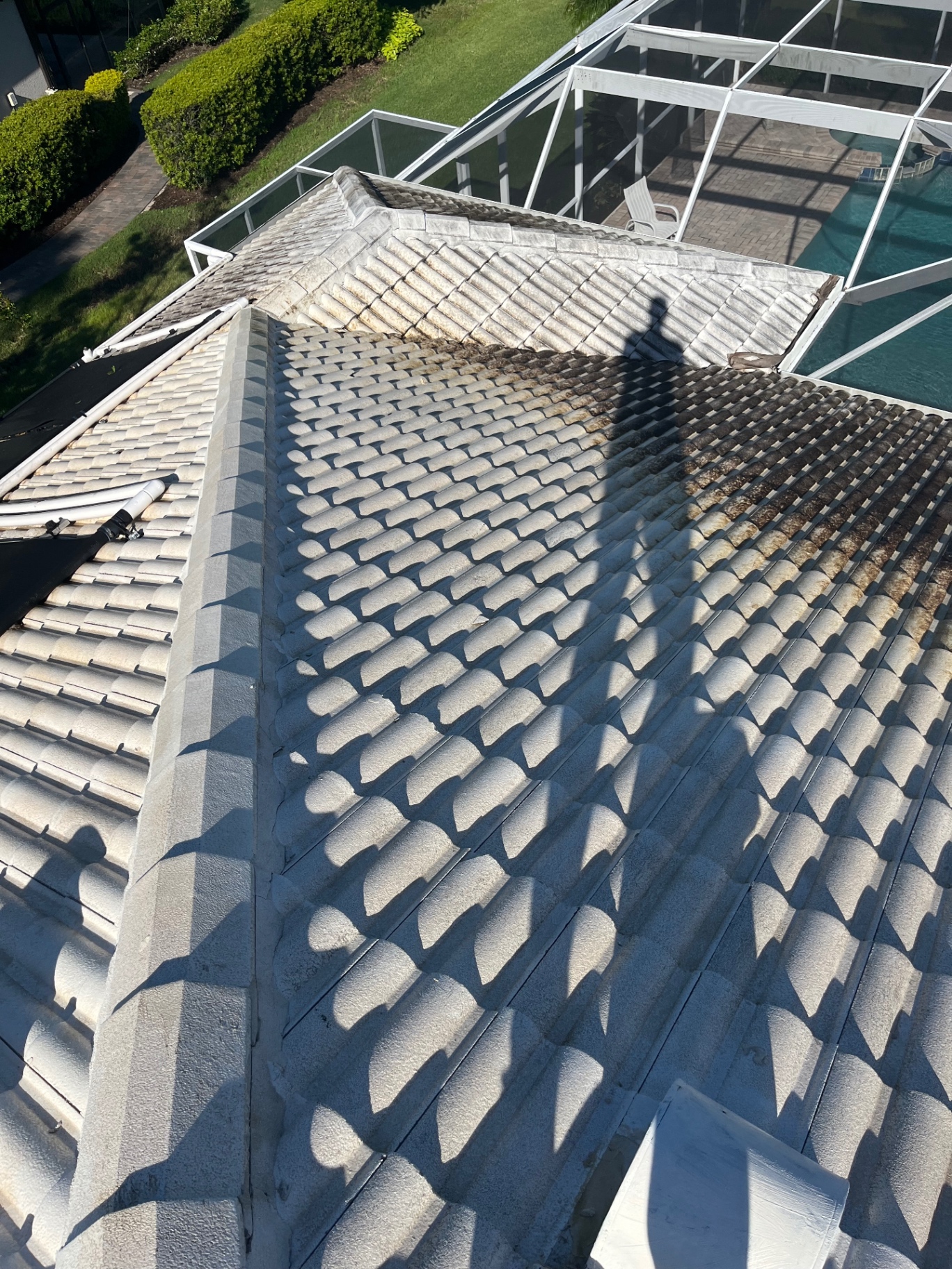 Tile roof soft wash in progress at a Tara Golf & Country Club home in Bradenton