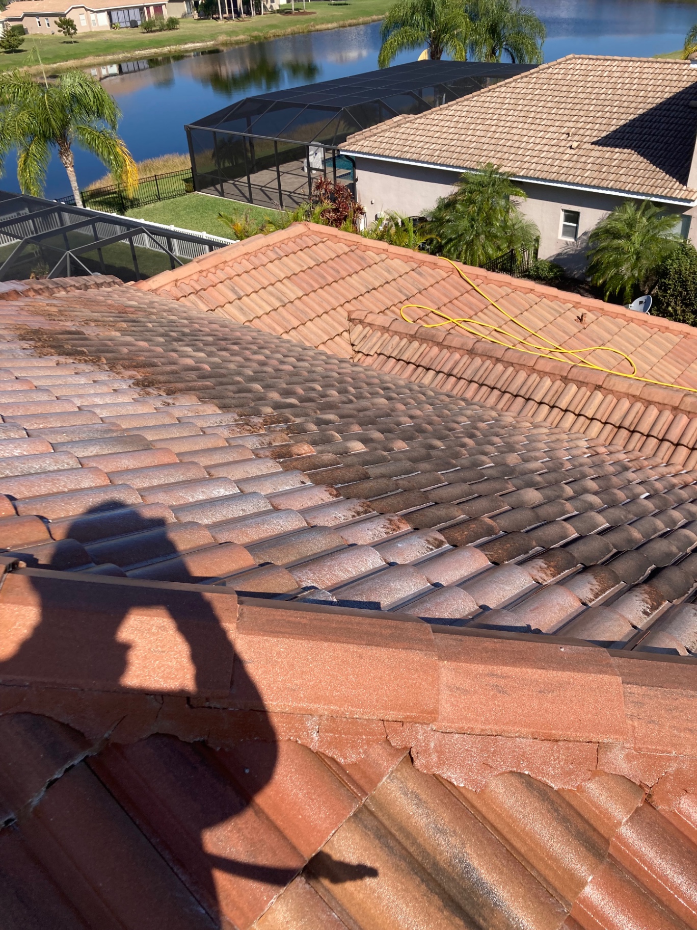 Roof soft wash results on a lakeside Greyhawk Landing tile roof
