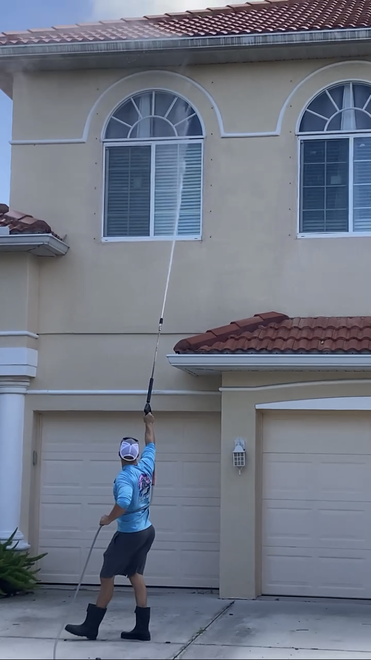 House wash in progress on a two-story Tara Golf & Country Club home